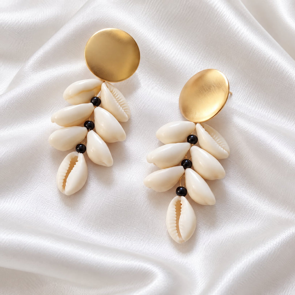 Cowrie disc drop earrings with gold studs and black beads